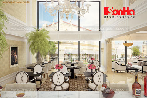 Không gian cafe được bố trí những ô kính mang tới khung cảnh sinh hoạt thường ngày của người dân Đà Nẵng để du khách chiêm ngưỡng.