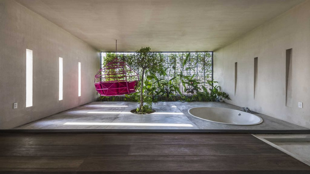 Ngôi nhà như được tạc từ khối bê tông khổng lồ, bể bơi điều hòa mát lạnh - Hình 7 Ngoi nha nhu duoc tac tu khoi be tong khong lo, be boi dieu hoa mat lanh-Hinh-7