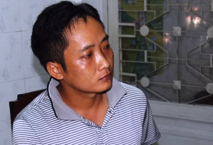 Hung thủ Nguyễn Văn Dũng hiện bị Công an quận 5 tạm giữ.