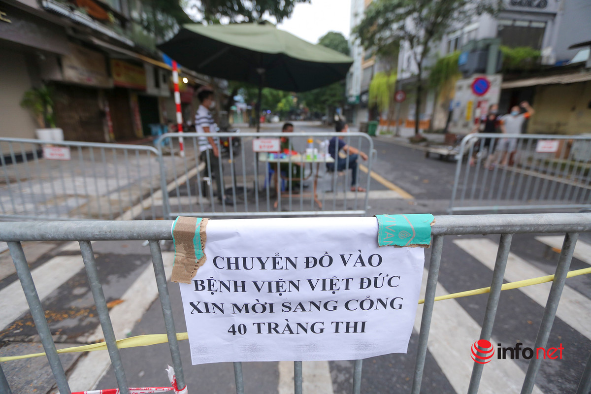 Phong toa nhieu con pho gan BV Viet Duc, khoang 1.000 nguoi nha benh nhan di cach ly-Hinh-2