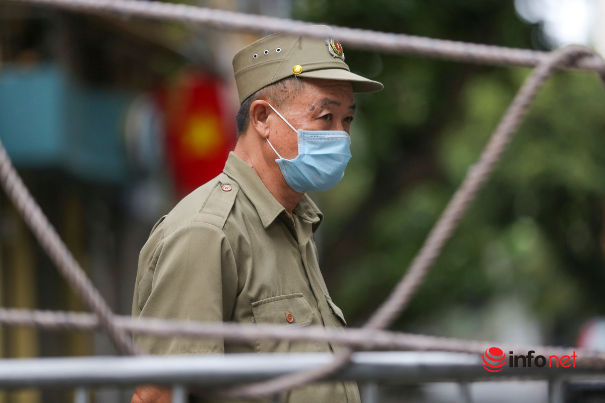 Phong toa nhieu con pho gan BV Viet Duc, khoang 1.000 nguoi nha benh nhan di cach ly-Hinh-4