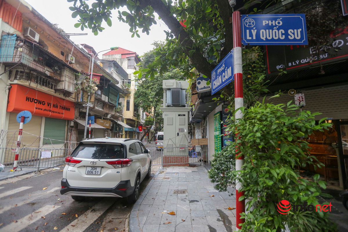 Phong toa nhieu con pho gan BV Viet Duc, khoang 1.000 nguoi nha benh nhan di cach ly-Hinh-3