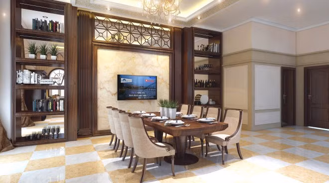 Khu vực trung tâm bếp và nhà ăn được bố trí bàn ăn 8 ghế, kệ trang trí đá và kính mang tới vẻ sang trọng.