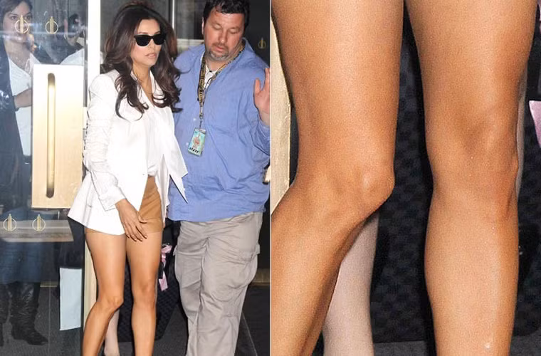 Eva Longoria xấu hẳn đi vì để lộ hai cái đầu gối củ lạc khi diện quân short đi chơi ở New York.