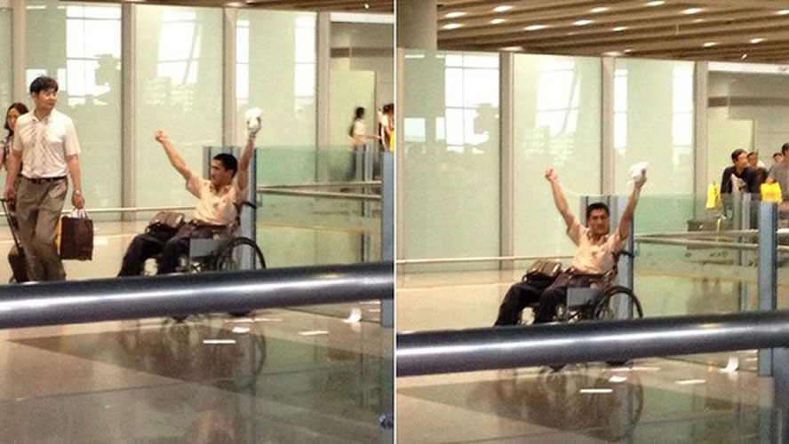 Chân dung người đàn ông ngồi xe lăn trước khi y đánh bom sân bay Bắc Kinh ngày 20/7.