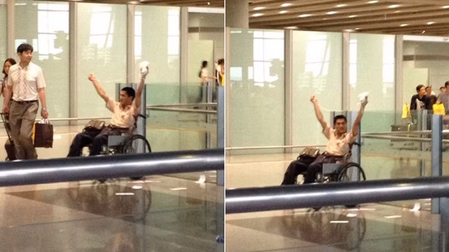 Chân dung người đàn ông ngồi xe lăn trước khi y đánh bom sân bay Bắc Kinh ngày 20/7.