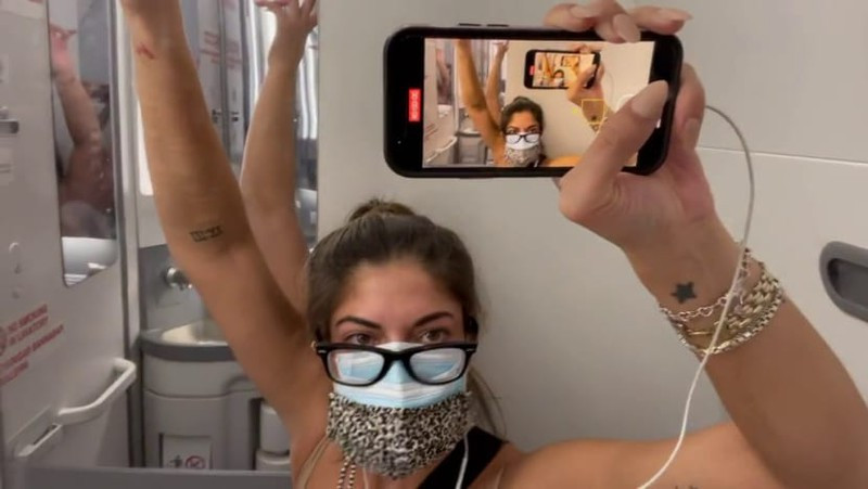 Cach ly trong nha ve sinh khi biet tin nhiem COVID-19 tren may bay