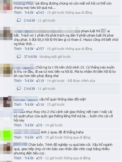 Cư dân mạng không đồng tính với cách ứng xử, và hành động của 2 CSGT trước người vi phạm. (Ảnh chụp từ Facebook)