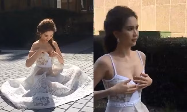 Diện thiết kế cúp ngực, Ngọc Trinh phải chỉnh trang để trang phục chỉn chu hơn.