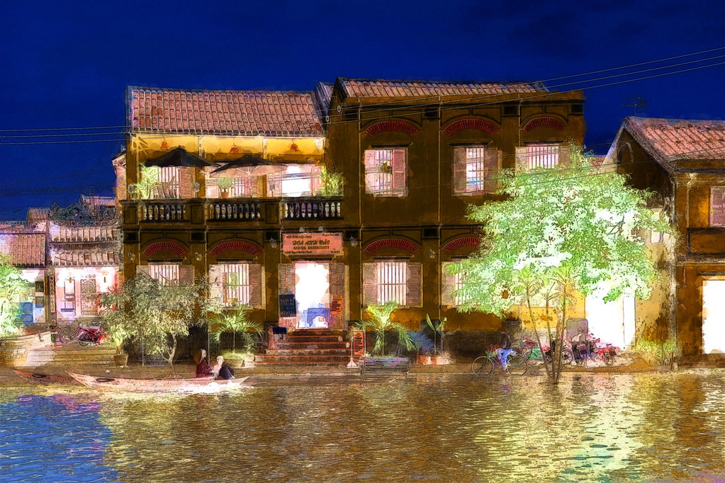 Phố cổ soi bóng xuống mặt sông.