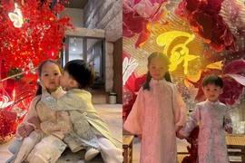 Hai con Đàm Thu Trang diện áo dài, chụp ảnh đón Tết trước biệt thự gia đình