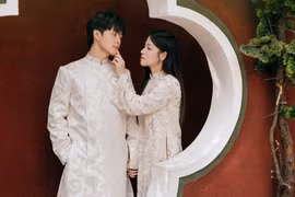 Vợ chồng Puka - Gin Tuấn Kiệt tay trong tay diện áo dài đón xuân