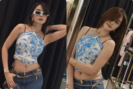 Chị gái Thiều Bảo Trâm dùng khăn làm áo, khoe dáng gợi cảm