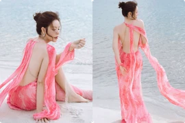 "Phú bà" Lý Nhã Kỳ gợi cảm với đầm xẻ cao, hở trọn tấm lưng