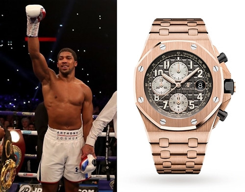 Tay đấm số 1 nước Anh Anthony Joshua không chỉ đút túi số tiền kếch xù từ các trận thi đấu, mà có khoản thu nhập “khủng” từ công ty riêng AJ Boxing and Commercial. Vậy nên việc sở hữu một chiếc đồng hồ lên tới gần 11 tỷ đồng như Audemars Piguet Royal Oak Off-Shore có lẽ không phải điều quá ngạc nhiên.