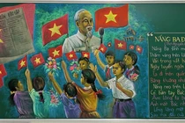 Thầy giáo vẽ tranh Chủ tịch Hồ Chí Minh trên bảng phấn