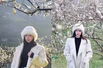 Đỗ Yên Đan chụp ảnh trong vườn hoa mận, nổi bật giữa mùa xuân Tây Bắc