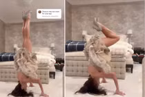 Nữ HLV yoga mặc váy ngắn trồng cây chuối gây tranh cãi