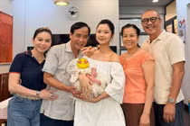 Hot girl Hàn Hằng trong ngày con gái đầy tháng