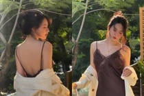 Nguyễn Minh Trang khoe trọn lưng trần gợi cảm, đẹp mong manh dưới nắng