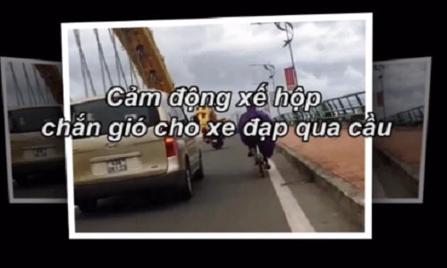 Video: Soái ca ô tô lái kèm che gió cho xe đạp lên cầu
