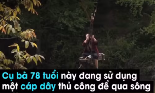 Sốc: Cụ bà 78 tuổi đu dây qua sông như siêu nhân