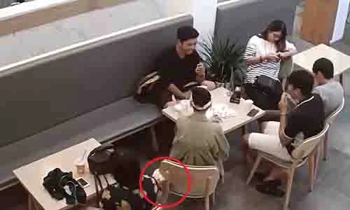 Video: Bé gái táo tợn trộm túi xách trong cửa hàng trà sữa