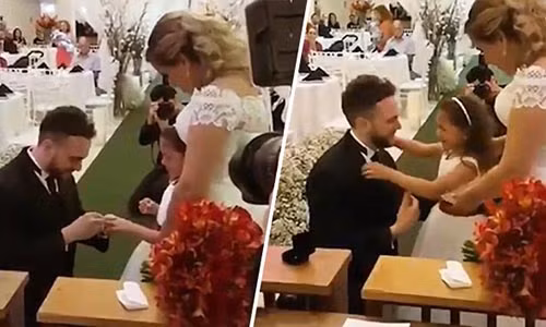 Video: Chú rể bất ngờ quỳ xuống cầu hôn con gái riêng của cô dâu