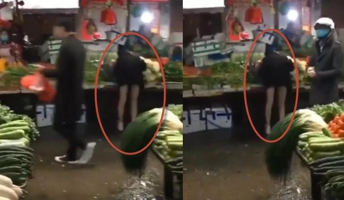 Video: Chân dài nằm gục trên hàng rau, người dân ngó lơ vì sợ virus Corona