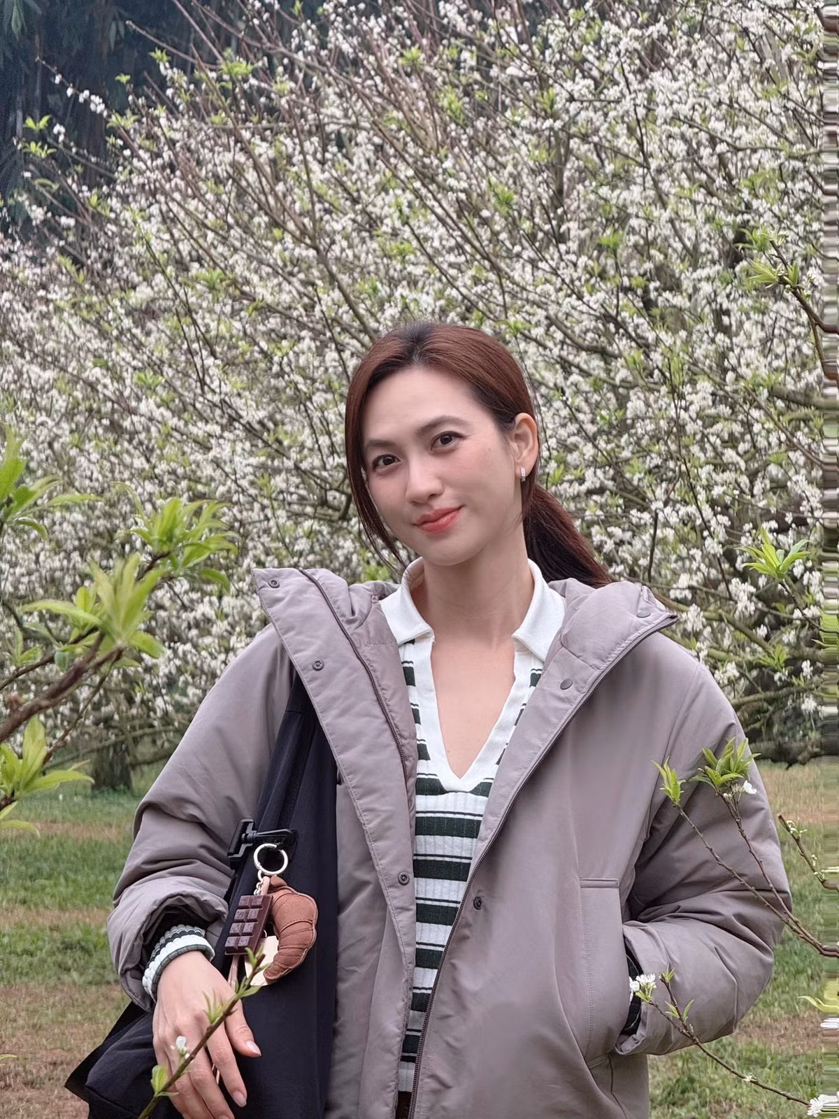 Tin tức sao Việt 8/12: Diễn viên Phương Anh Đào ngắm hoa mận ở Mộc Châu. Ảnh: FB Phương Anh Đào