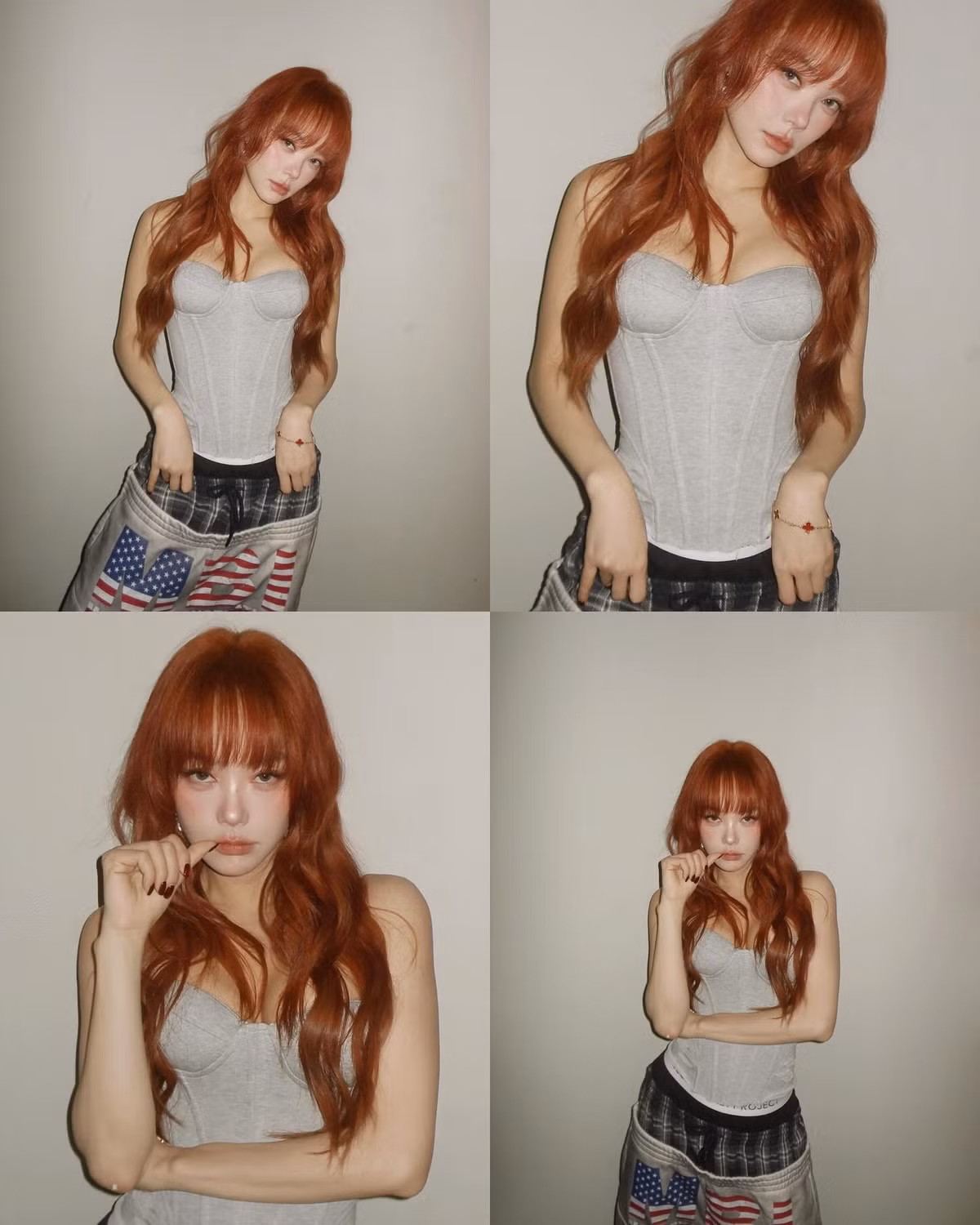 Trong bộ ảnh lần này, Minh Hằng lựa chọn phong cách cá tính. Cô diện áo khoác tông đỏ nổi bật kết hợp corset ôm sát, tôn trọn vòng eo gọn gàng cùng những đường cong mềm mại.