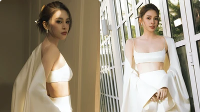 Tiểu Vy diện áo chỉ ngắn bằng gang tay, lộ bờ vai gợi cảm