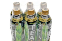 Trà Ô Long Tea+ Plus pha chế bằng dây chuyền Trung Quốc?