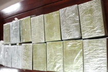 Ô tô vô chủ chứa 50 bánh heroin ở KTT Văn Khê