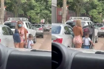 Ăn mặc hớ hênh đưa con đến trường, bà mẹ trẻ hứng “gạch đá”