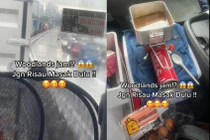 Kẹt xe quá lâu, tài xế nấu ăn trong buồng lái xe tải