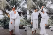 Cặp đôi Malaysia gây sốt mạng với bộ ảnh cưới giữa mùa lũ