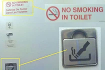 Hút thuốc trong phòng vệ sinh máy bay, khách hàng nhận quả đắng