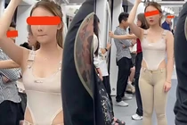 Diện đồ ôm sát trên tàu điện ngầm, cô gái lộ điểm kém duyên