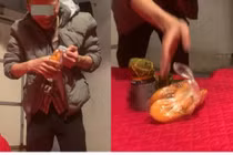 Đi ăn cỗ lấy phần mang về cho vợ, anh chồng tạo "điểm nhấn"