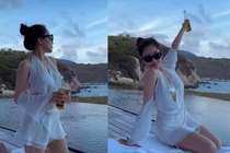 Trâm Anh đi biển, khoe tấm lưng trần nõn nà body miễn chê