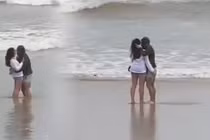 Xôn xao cặp đôi tình tứ tại biển Đà Nẵng sau trận lũ