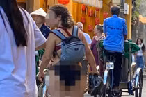 Nữ du khách mặc bikini trong phố cổ Hội An gây bức xúc