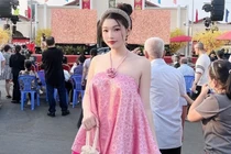 Hot girl bắn cung đẹp nhất Sài Gòn diện áo yếm căng tràn sức sống