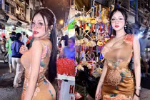 Lên "phố Tây" Bùi Viện, hot girl áo dài khoe vòng 1 đẫy đà
