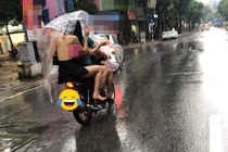 Nhức mắt thiếu nữ chạy mưa "quên mặc áo", lộ cả tấm lưng trần