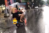 Nhức mắt thiếu nữ chạy mưa "quên mặc áo", lộ cả tấm lưng trần