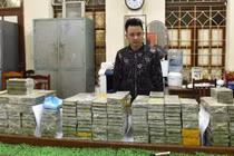 Thủ đoạn mua bán heroin của các đối tượng trong đường dây 500 bánh