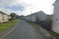 Lùi xe, người đàn ông cán tử vong con trai nhà hàng xóm