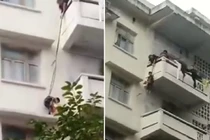 Phẫn nộ vợ chồng già dùng cháu trai 7 tuổi cứu mèo cưng kẹt ở ban công